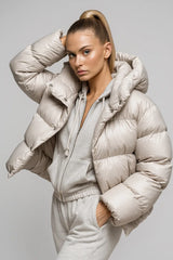 Women's beige puffer jacket with hood and casual loungewear