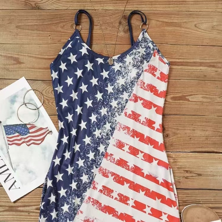 Woman wearing a sleeveless dress with distressed American flag print, taking a mirror selfie with stars on one side and red stripes on the other.

